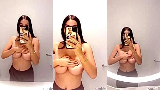naughty onlyfans babe Sophie Mudd shows off her big boobs in front of the mirror