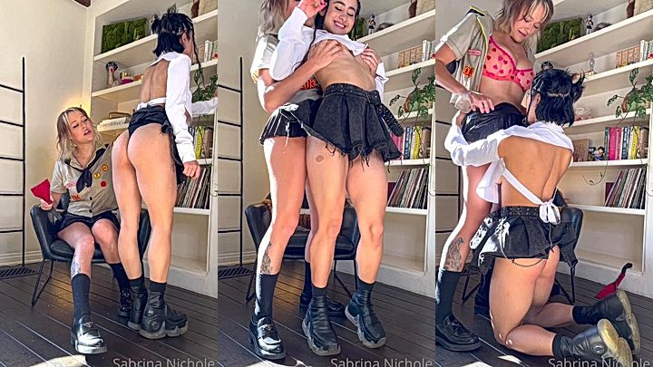 horny chick is having a great time showing off her sexy body in the ofice with her sexy bff