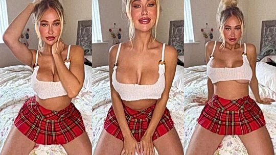 sexy onlyfans model  Sophie Reade jiggles her big tits really hard