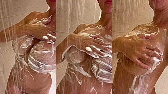 wet onlyfans model Sophie Reade takes a bath in the shower and rubs her soapy big tits