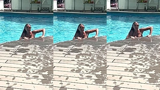 naughty onlyfans model Sophie Reade takes a swim i the pool